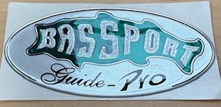 Bass Sport Guide Pro logo, oval with fish shape, silver, green, and white.
