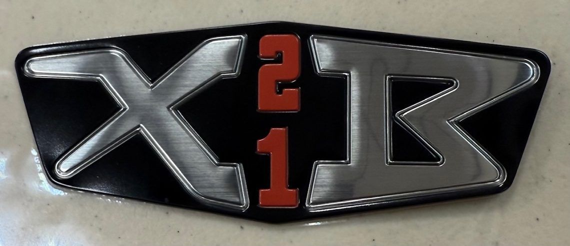 Black and silver emblem with 