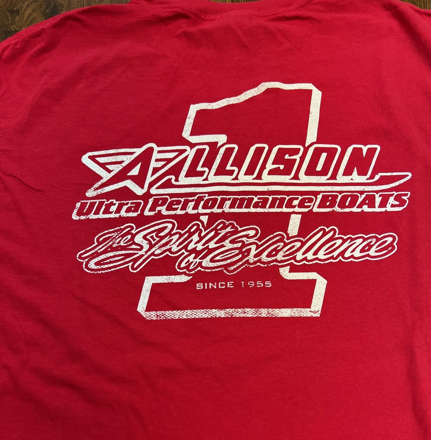 Red t-shirt with white logo: 