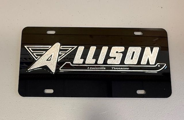 Silver Allison license plates with red and black logo, Louisville, Tennessee.