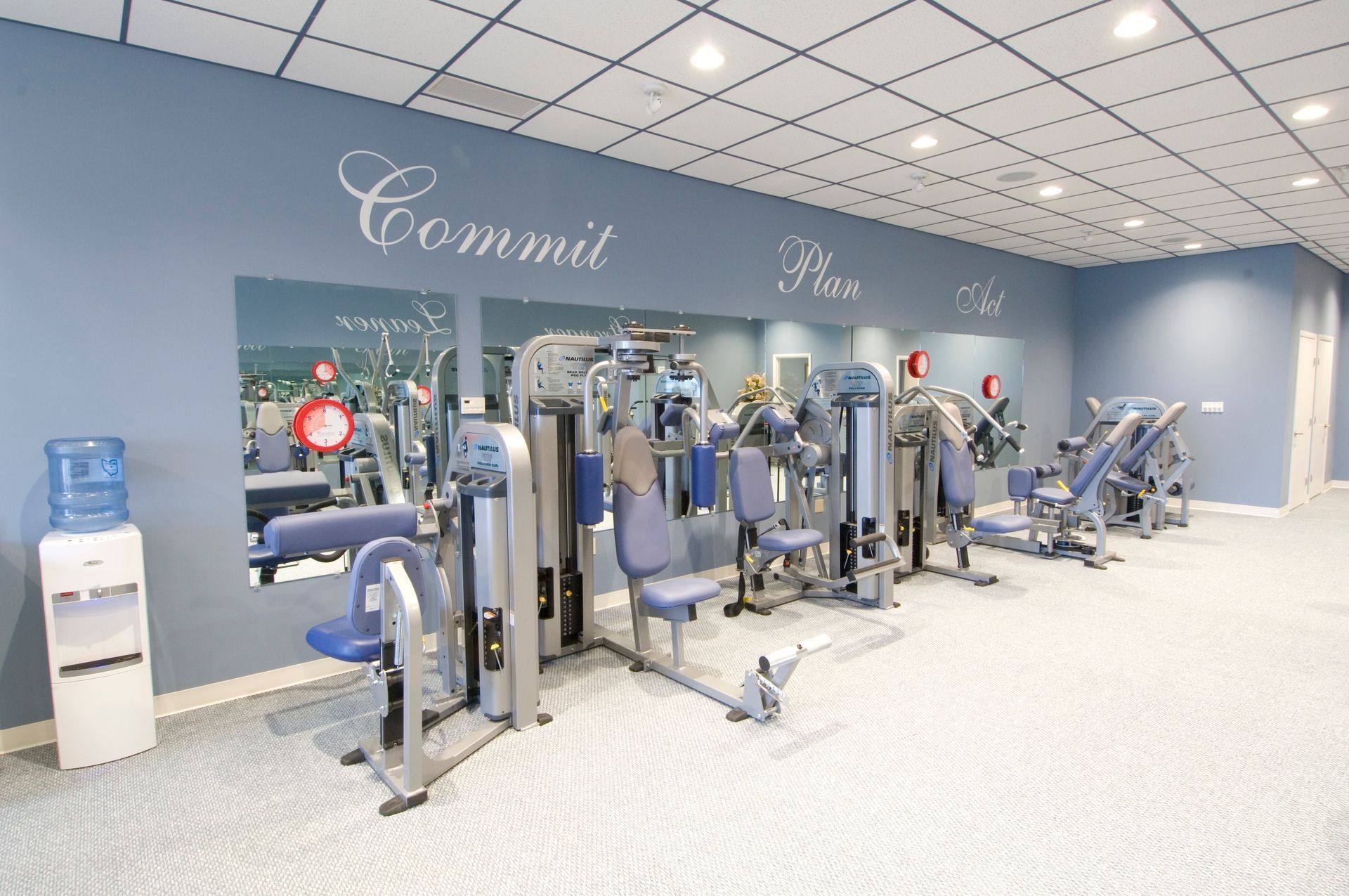 A Gym with a Sign on the Wall that says Commit | Uniontown, OH | My Personal Trainer