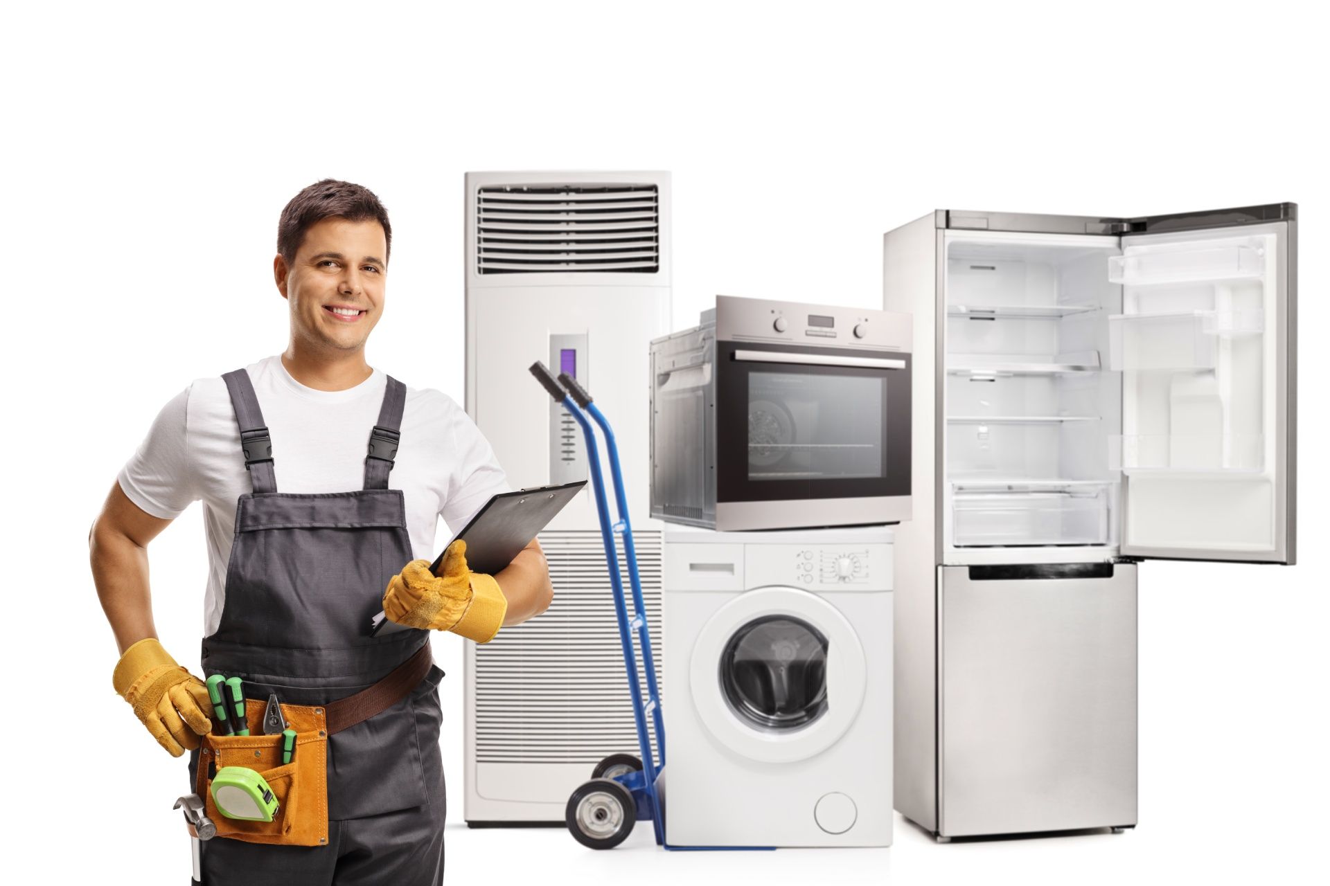 A man is standing in front of a washing machine , refrigerator , microwave and air conditioner.