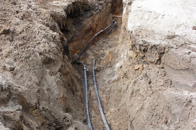 Installing Pipes for Geothermal Job — South Bend, IN — Maurer Well & Pump Service Inc