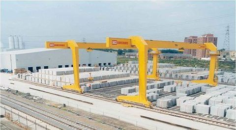 cranes moving containers