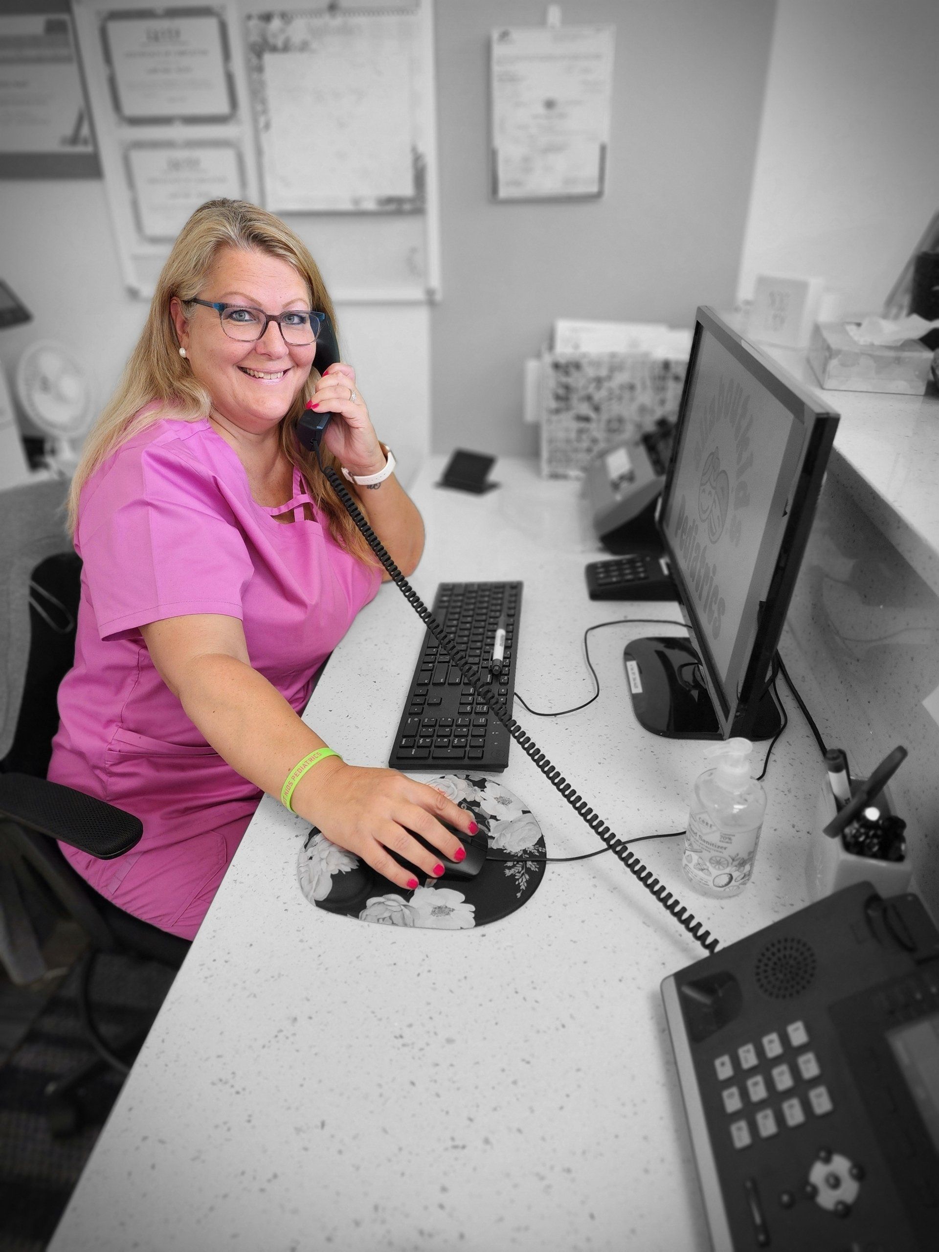 judy on phone at desk