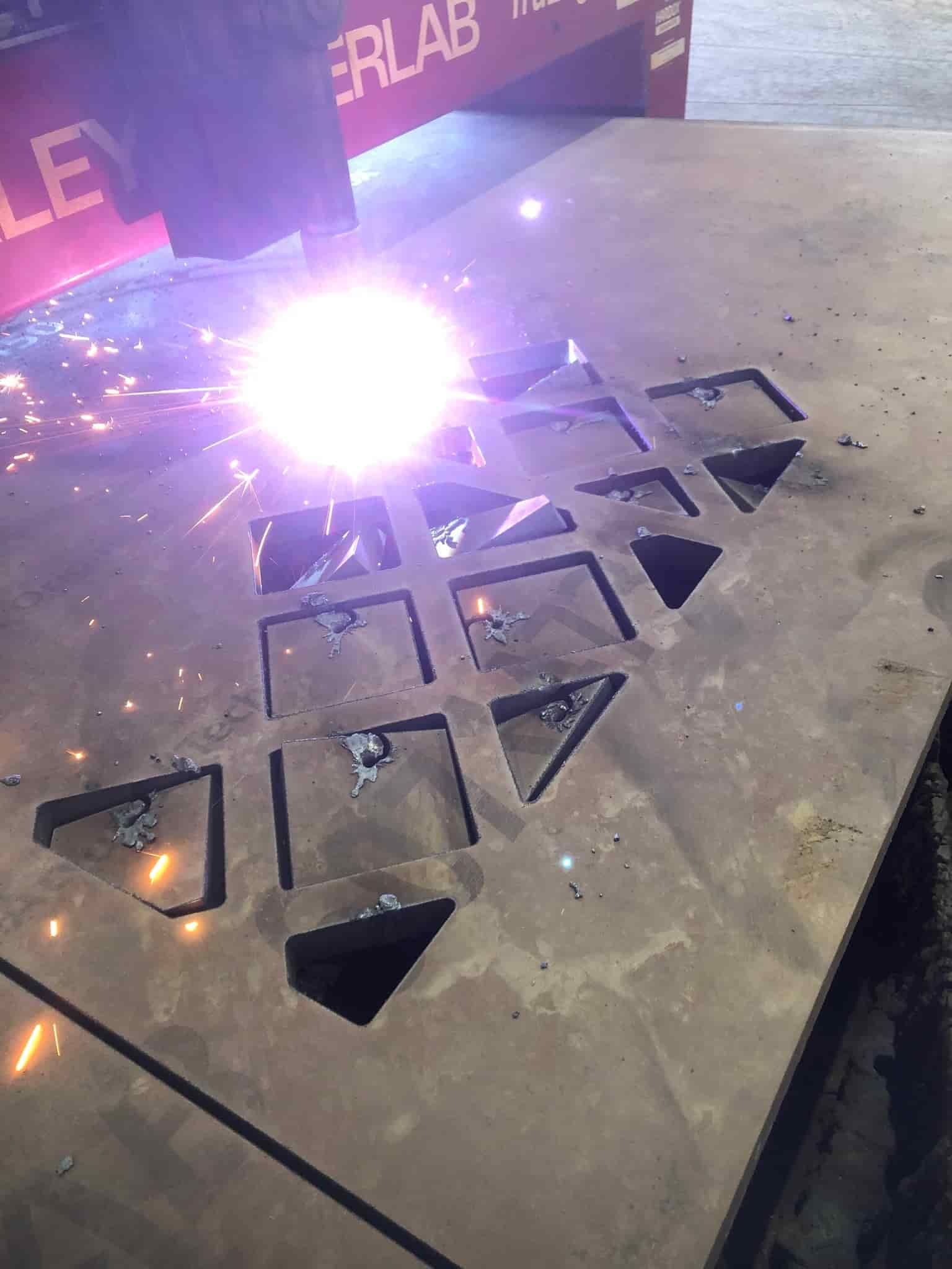A Large Metal Container is Sitting in a Warehouse — North Queensland Hard Facing (NQHF) In Collinsville, QLD