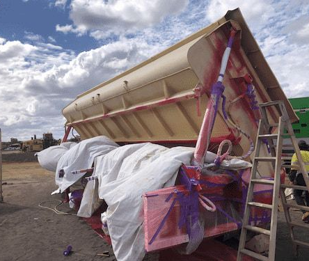 Dump Truck With Raised Bed, Covered in Protective Sheets — North Queensland Hard Facing (NQHF) In Mount Isa, QLD