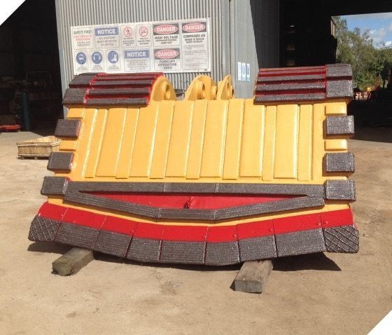 A Yellow and Red Barrier is Sitting in Front of a Sign — North Queensland Hard Facing (NQHF) In Fredericksfield, QLD