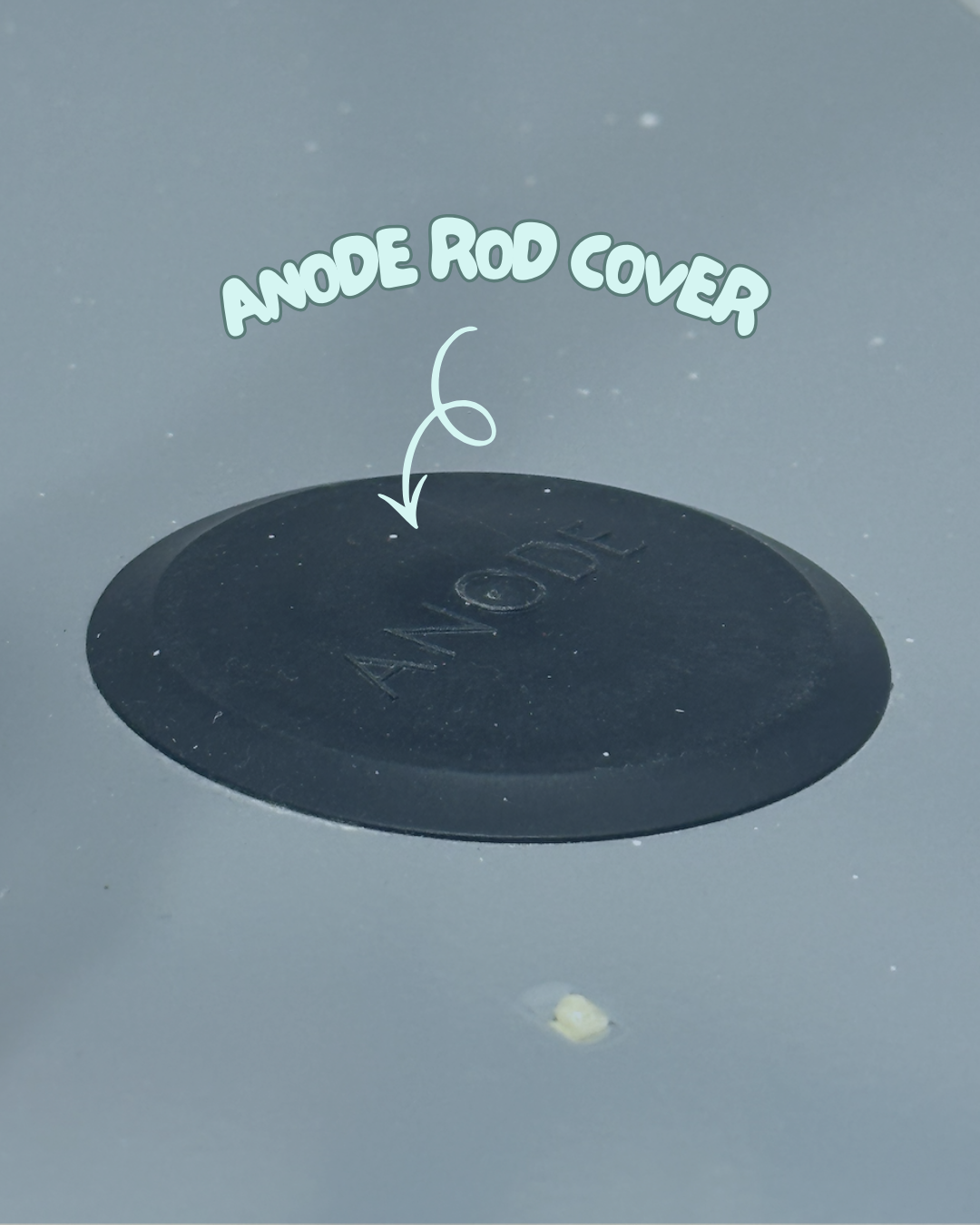 Close-up of anode rod cover with label 