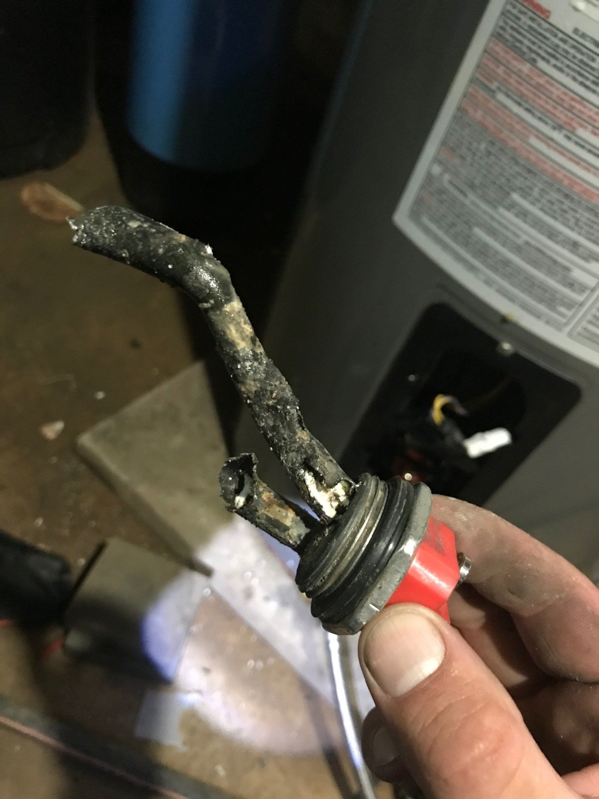 Disintegrated water heater element caused by sediment build-up