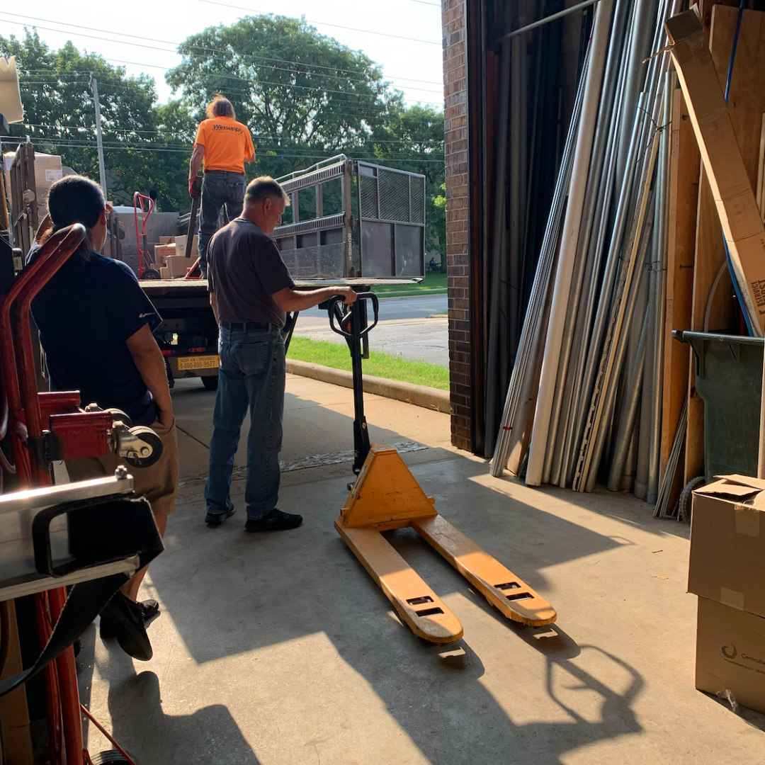 Water Heater Parts Warehouse Team Unloading Order in Arlington Heights, Illinois
