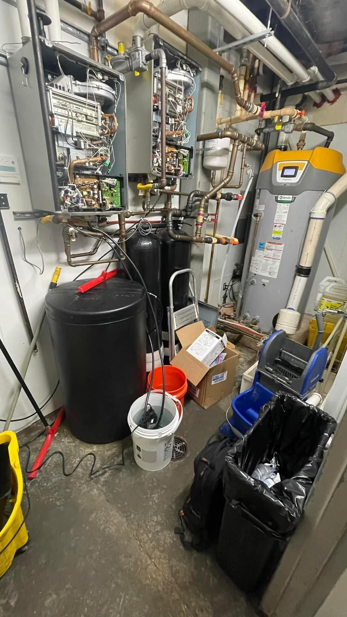Commercial preventative maintenance on A.O. Smith BTH and two tankless water heaters, behind the scenes of water heater maintenance