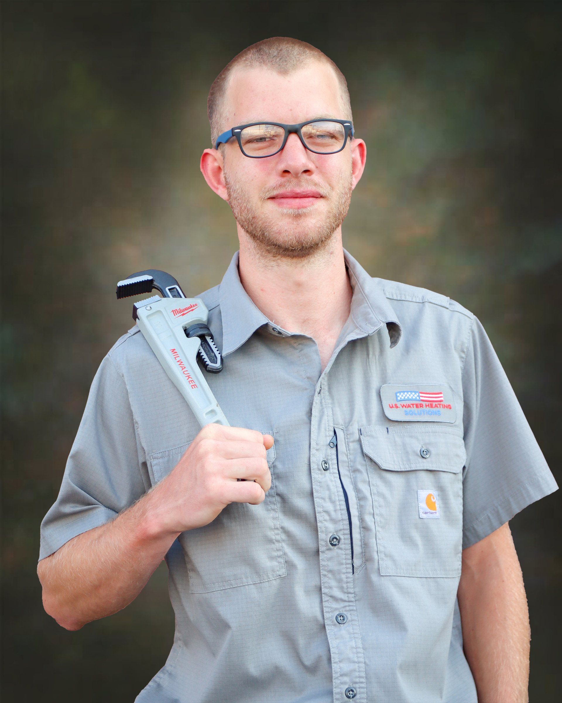 Headshot of Water Heater Repair Technician and Licensed Kentucky Plumber, Stephen, holding pipe wrench