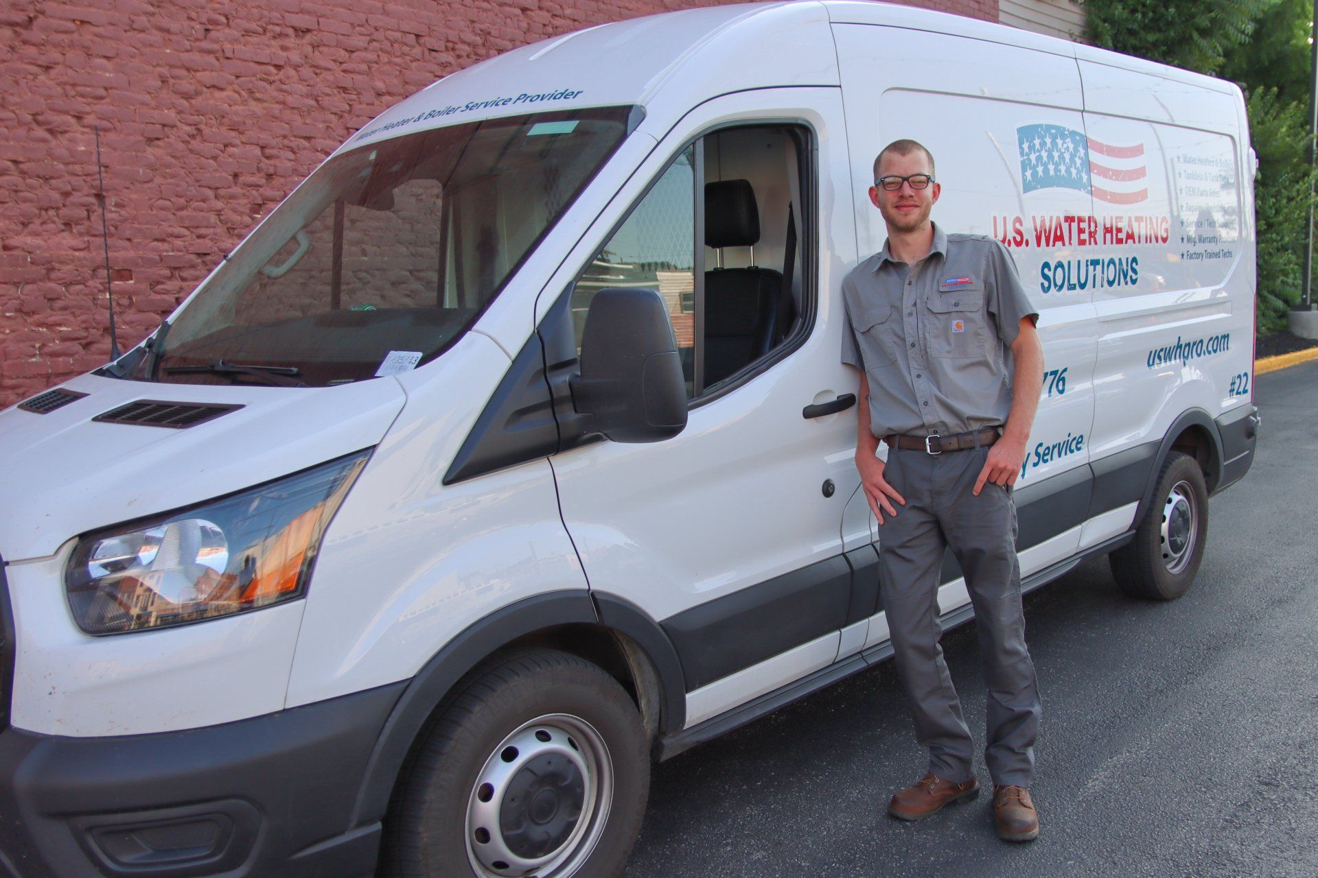 Water Heater Repair Technician Stephen leaning against his uswhpro truck in Winchester, KY