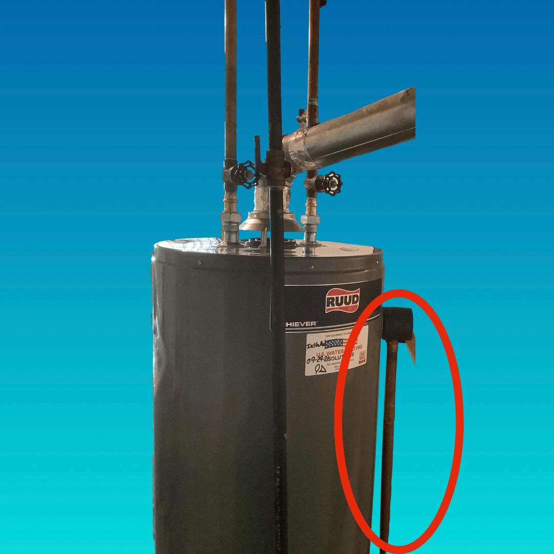 Overflow Pipe on Water Heater Circled in Red on Blue Ombre Background