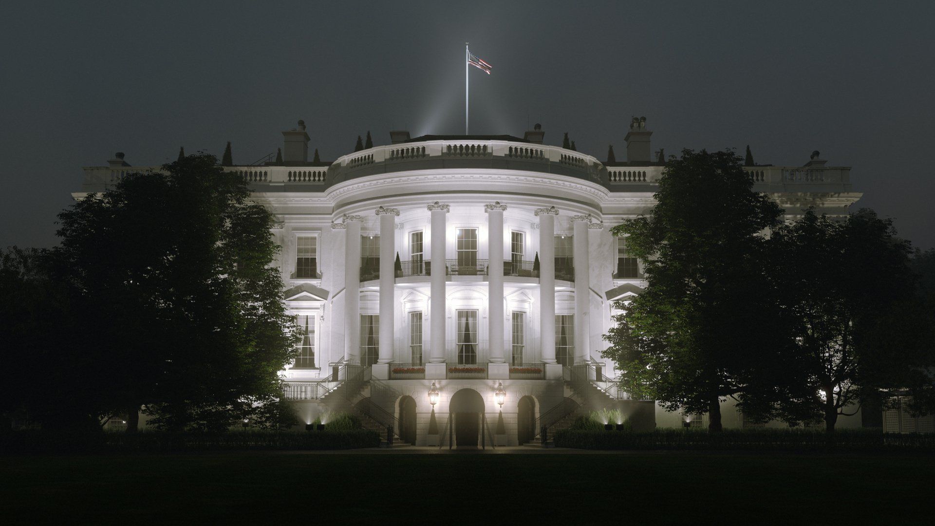 White House lit up at night - with trees