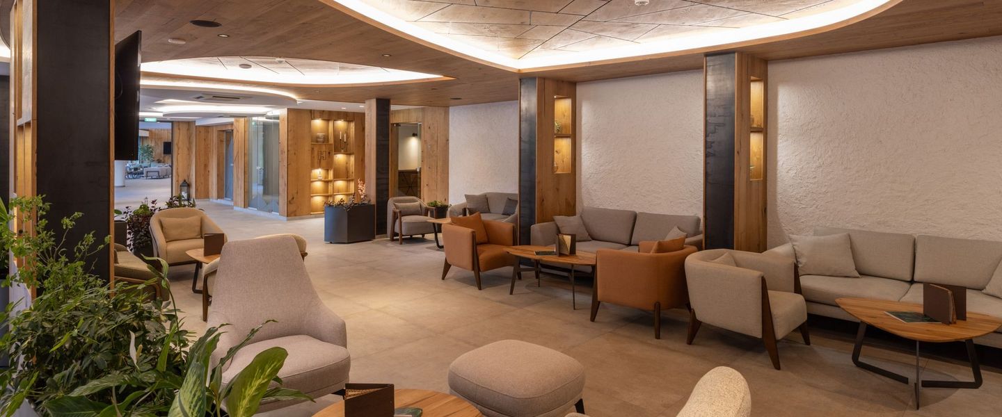 A living room filled with furniture and a couch.