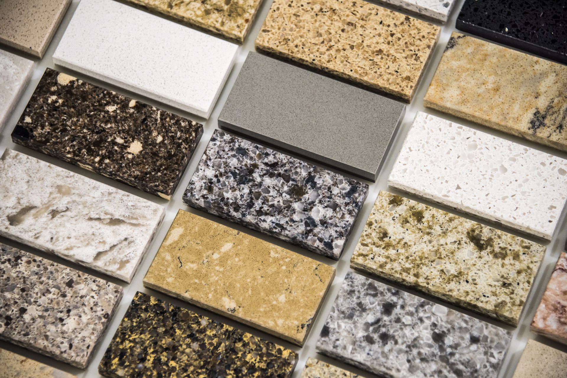 There are many different types of granite in this picture.