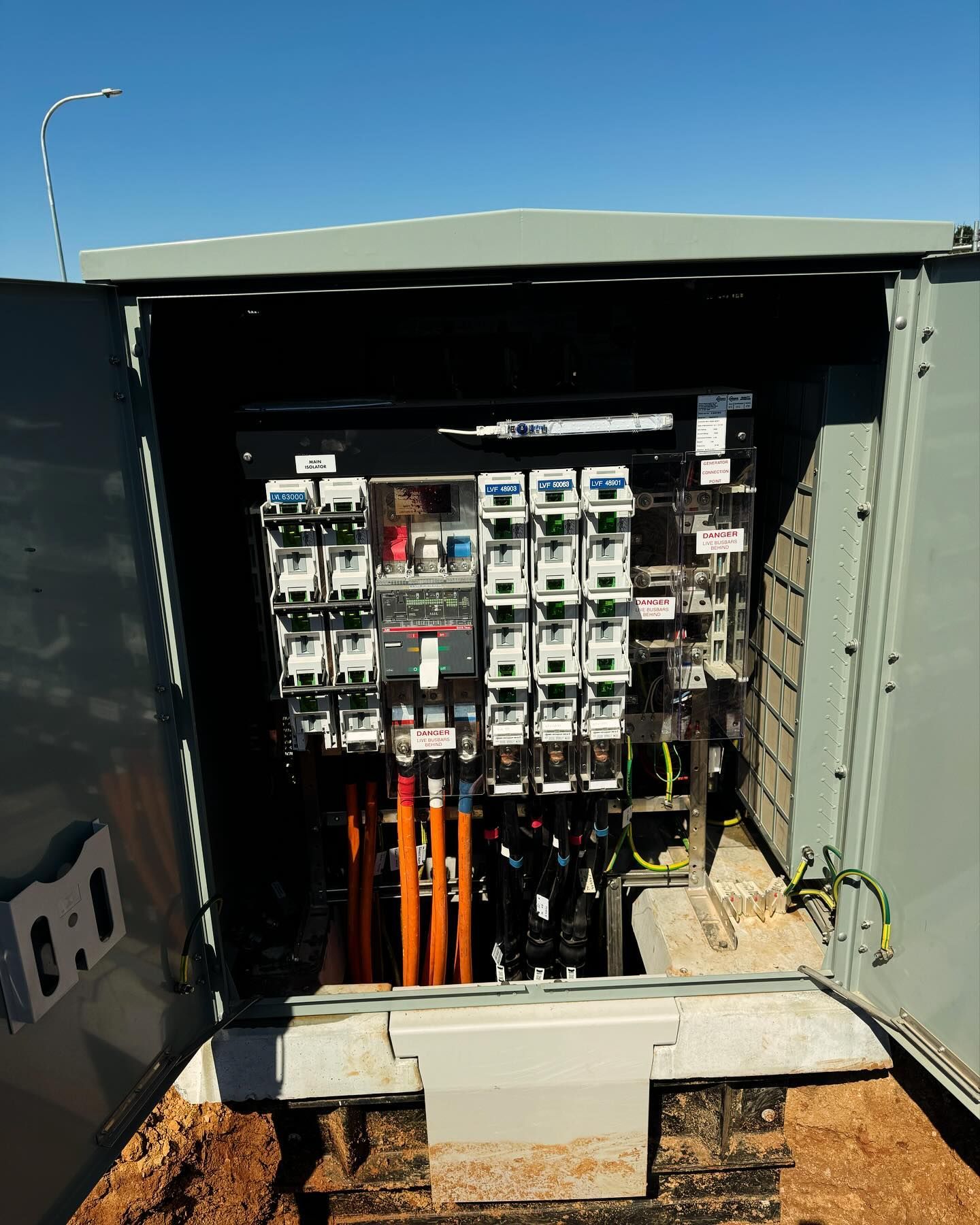 Open Electrical Cabinet With Circuit Breakers and Wiring — Central West Power Construction in Orange, NSW