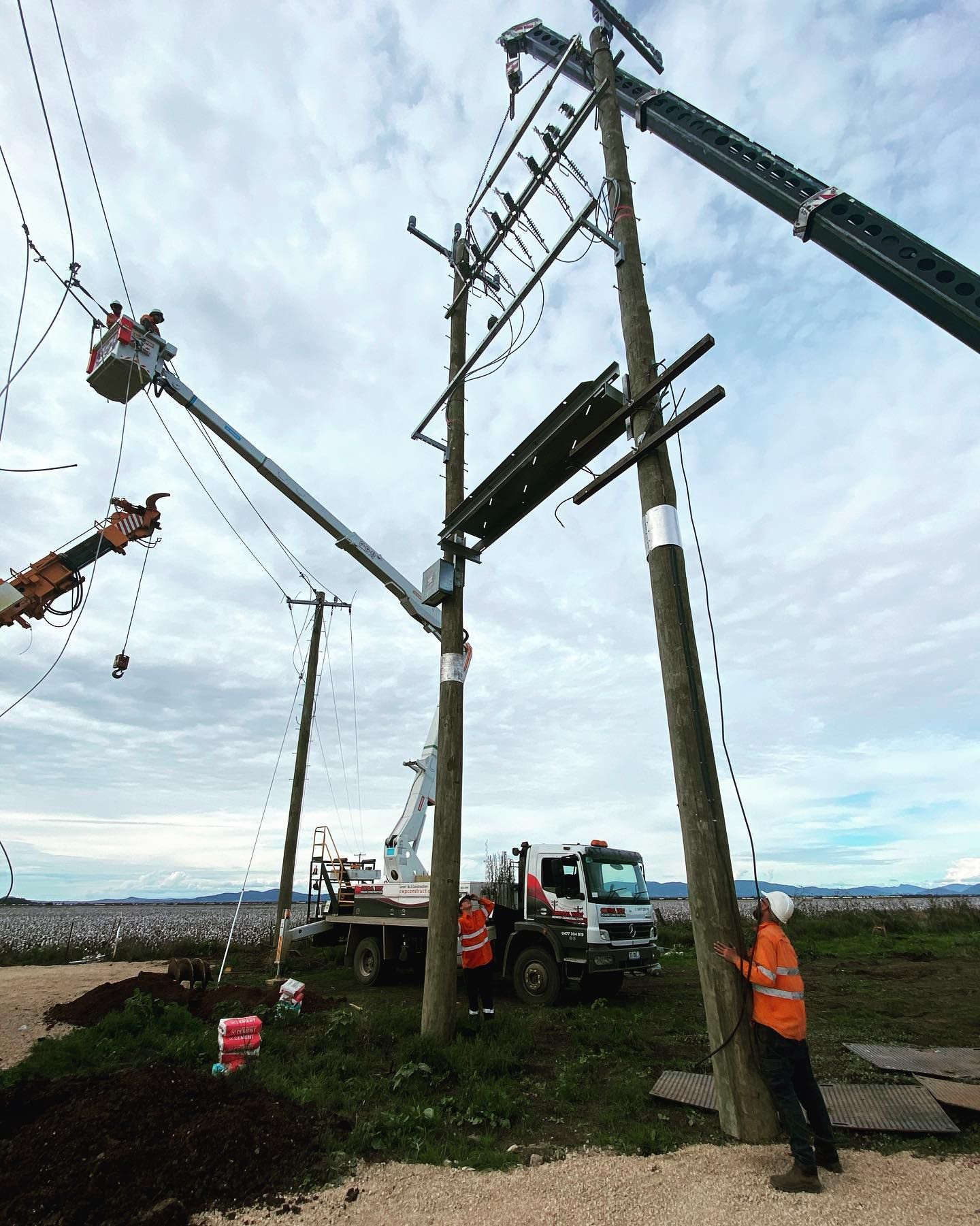 Utility Workers Replacing a Power Pole With Crane Assistance — Central West Power Construction in Orange, NSW