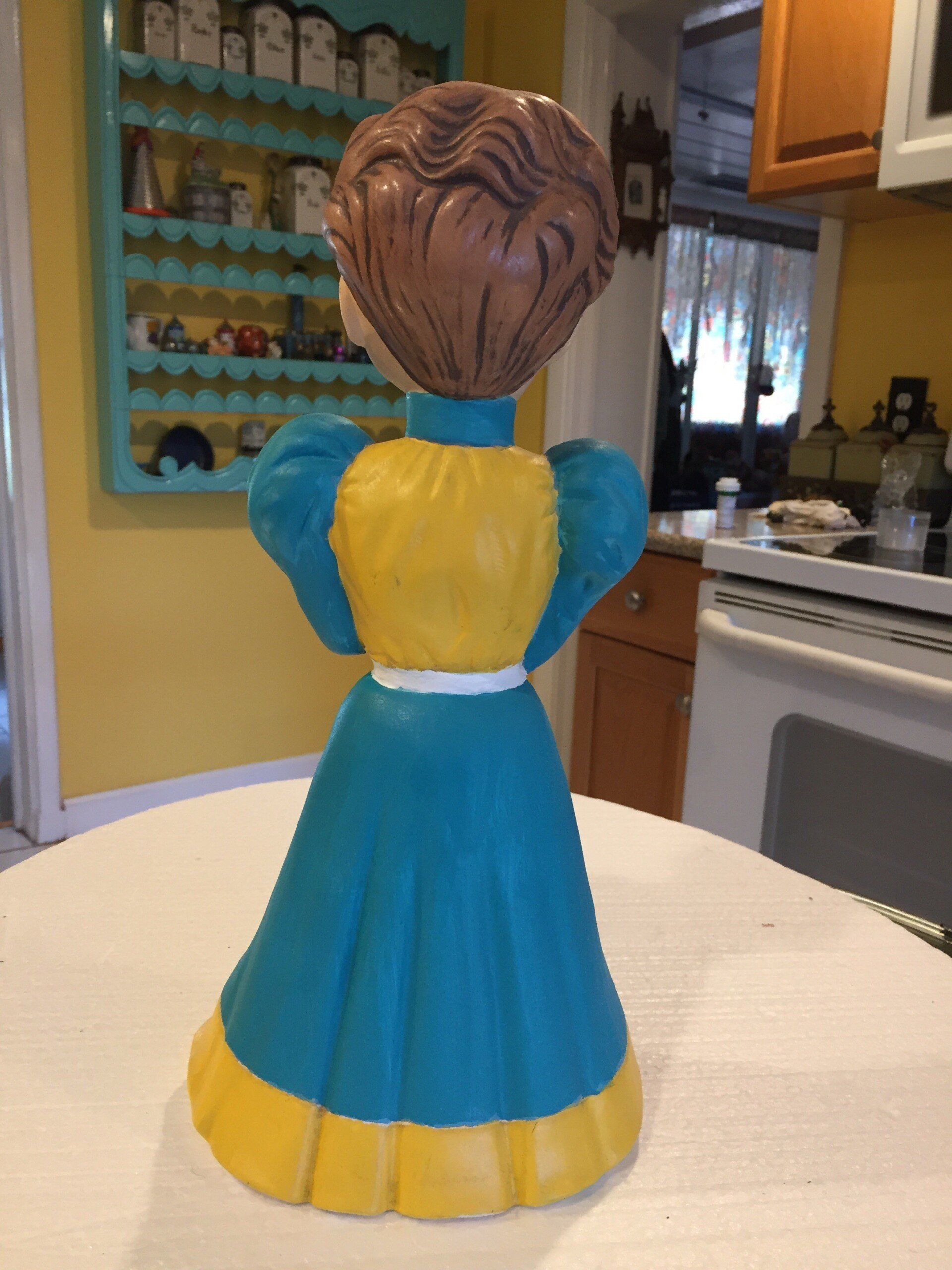 Back View Of A Doll — Tampa, FL — Antique Restoration and Design