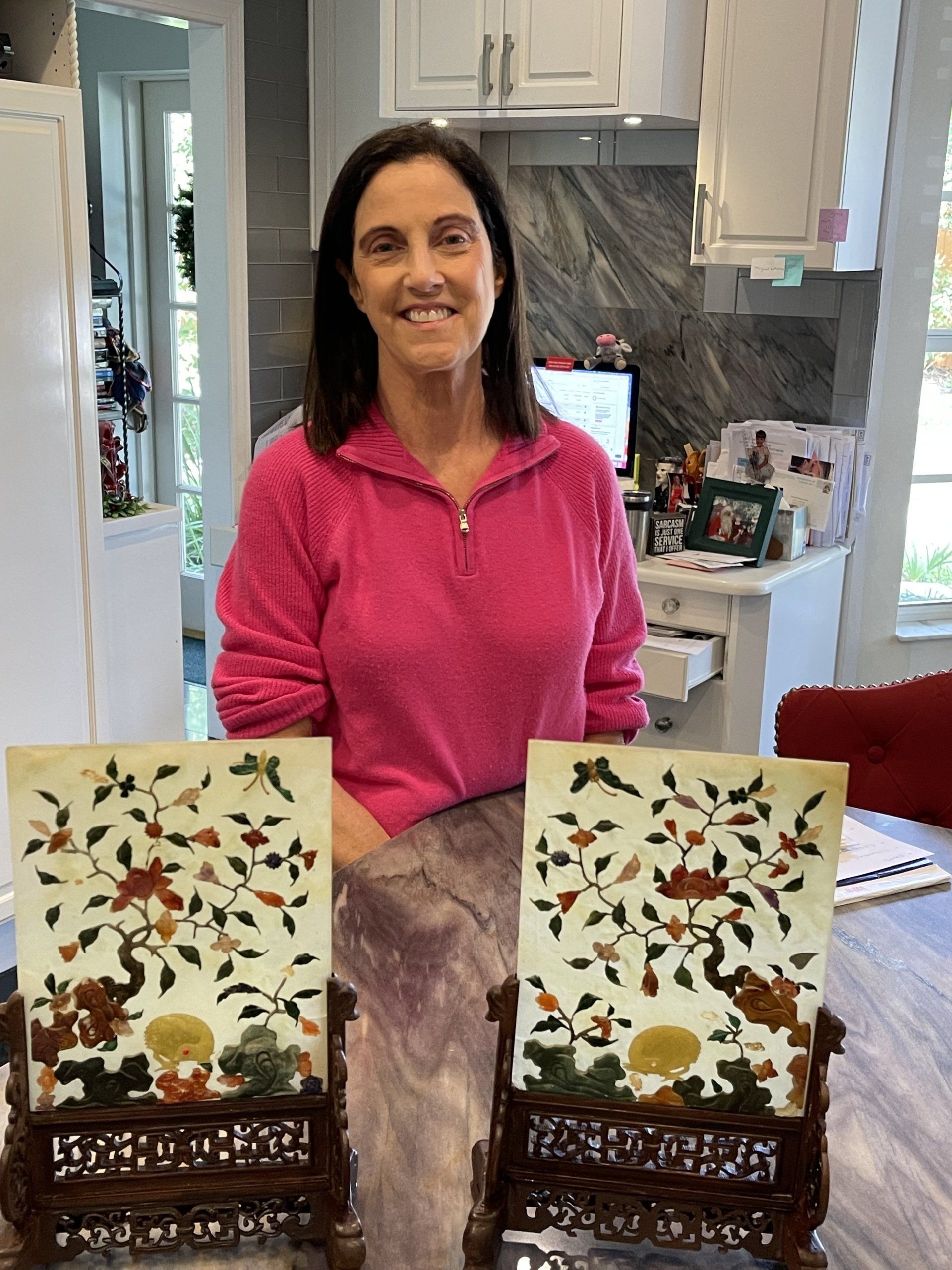 Happy Woman With Her Paintings — Tampa, FL — Antique Restoration and Design
