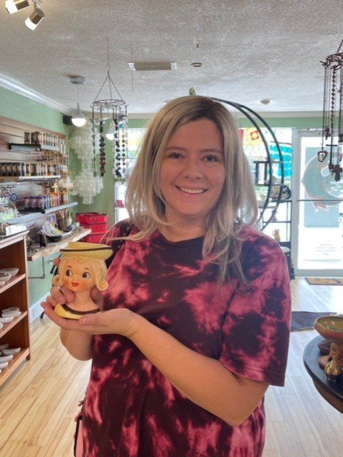 Man With Round Ceramic — Tampa, FL — Antique Restoration and Design