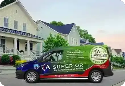 The service van of A Superior AC parked in front of a Panama City Beach home.