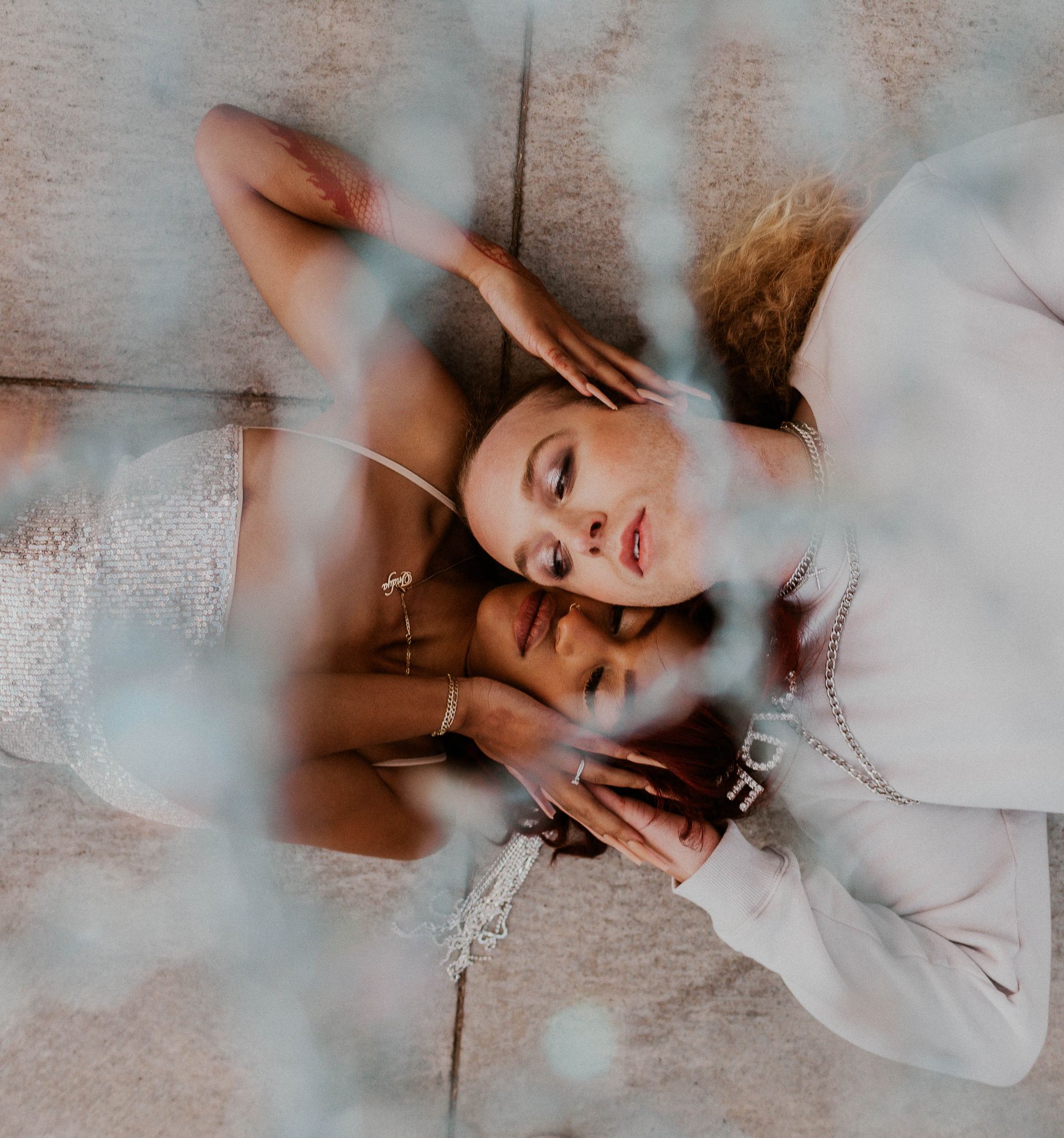 Scotty modeling for a styled shoot with a female model for a wedding photoshoot themed around basketball