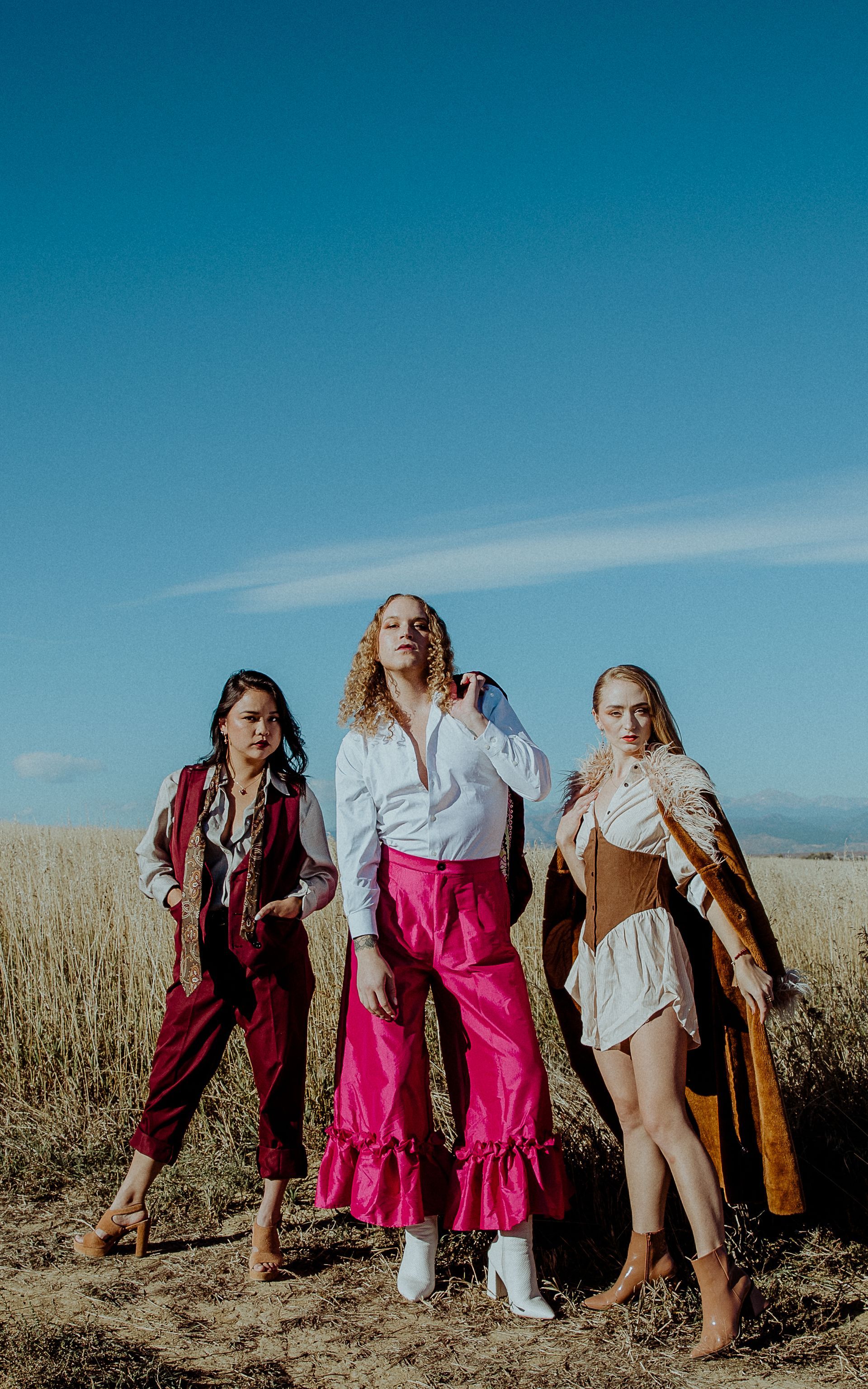 Scotty with a group of models for an outdoor photoshoot