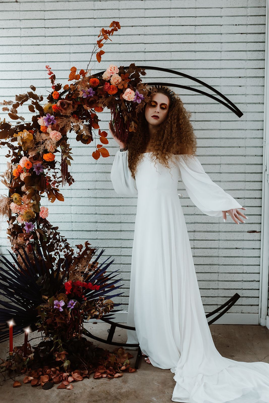 A professional photo of Scotty, modeling for a fall-themed goddess photoshoot