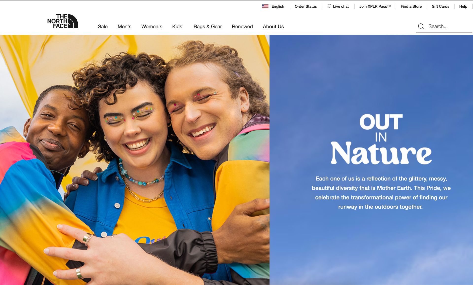 A group of people are hugging each other on The NorthFace website homepage for a photoshoot.