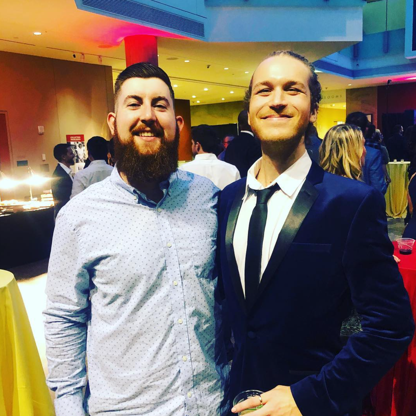 Scotty posing with a coworker at a professional event