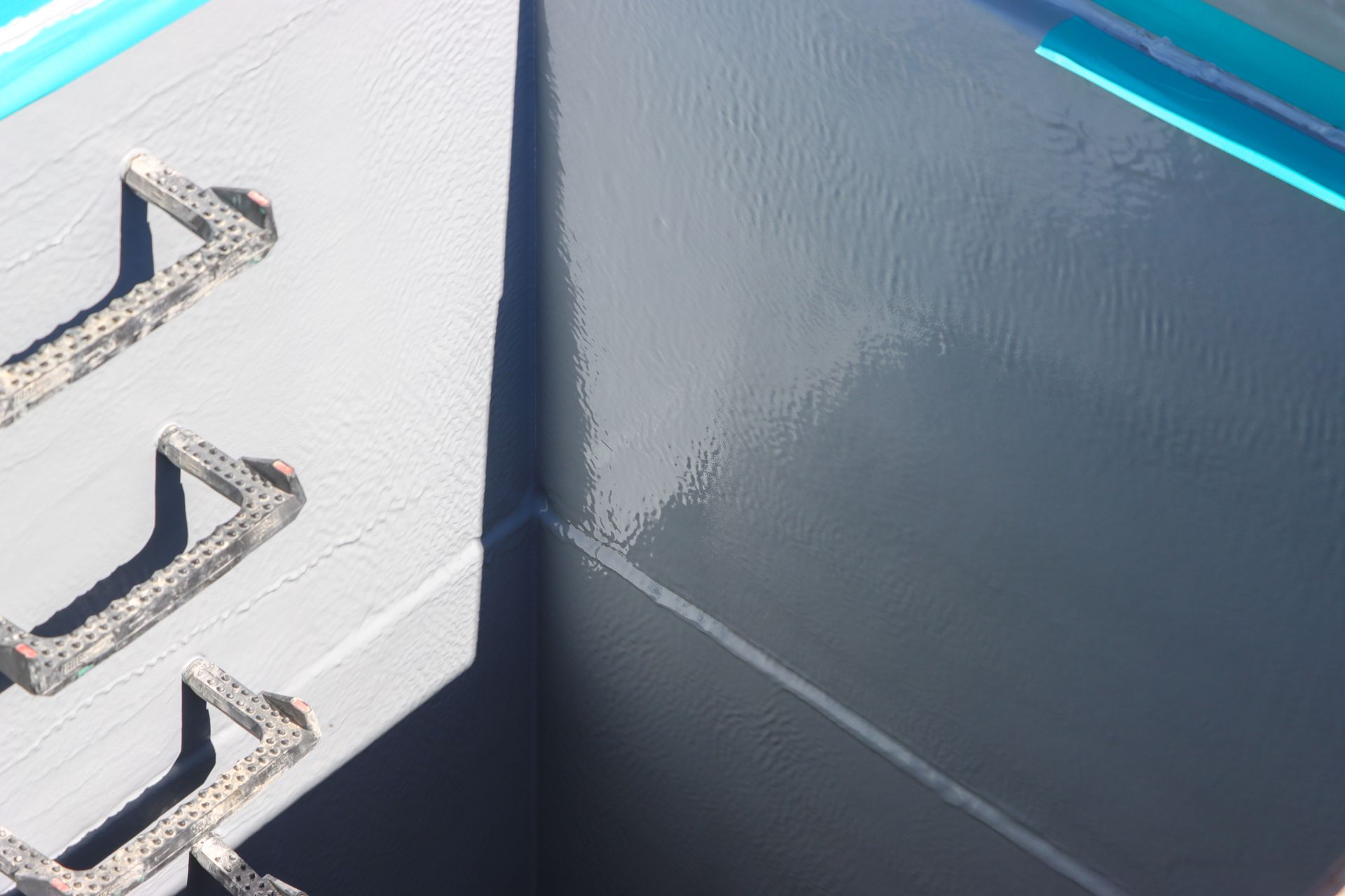 A bunch of ropes are laying on the ground.