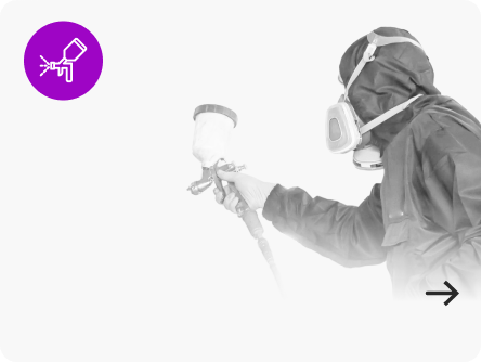 Person in protective gear sprays paint with a spray gun, purple paint icon on the left | Axe-A-Dent Auto Collision