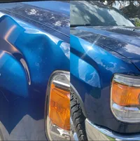 Blue truck fender before and after dent repair.
