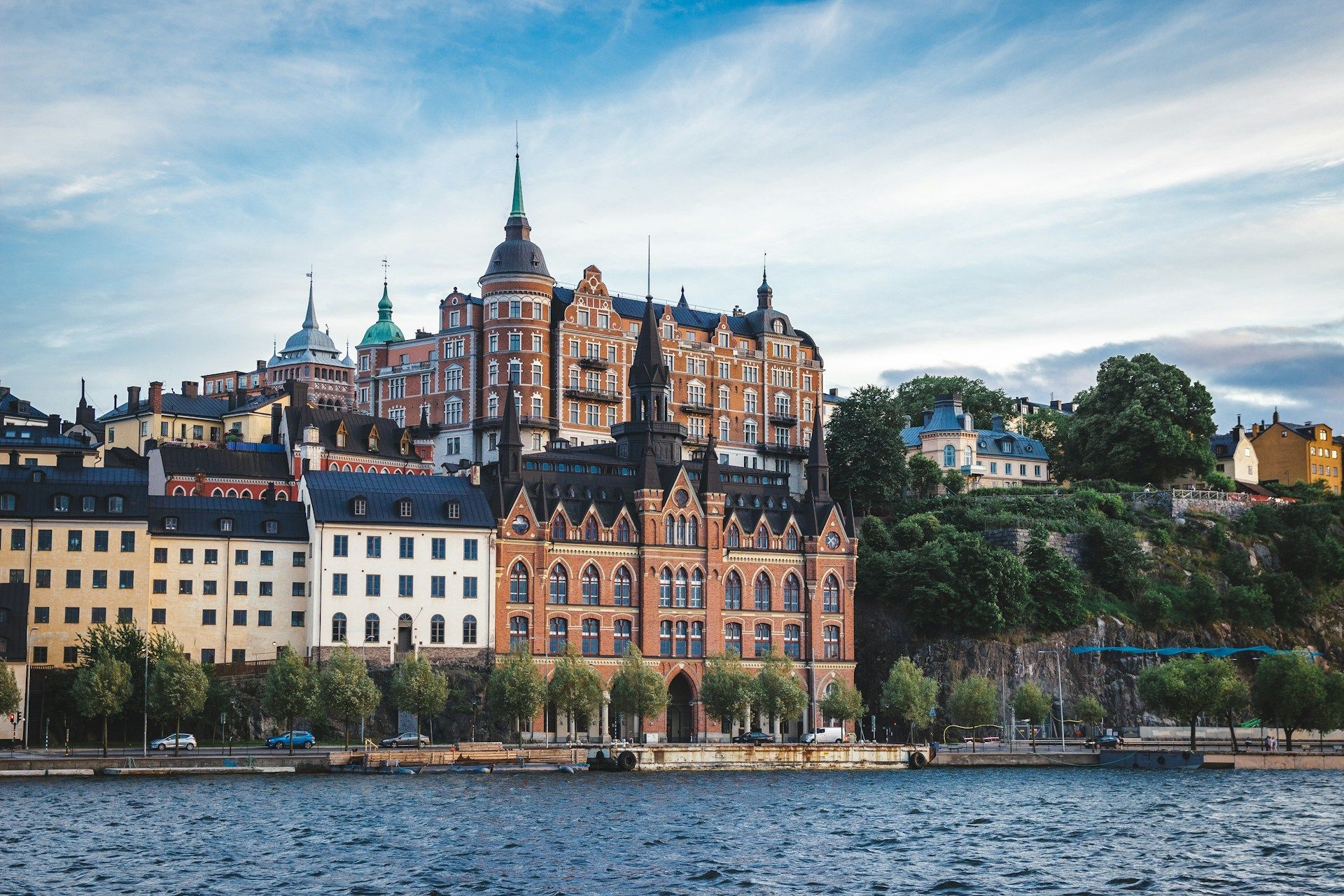 A scenic view of historic buildings along Söder Mälarstrand in Stockholm, Sweden.