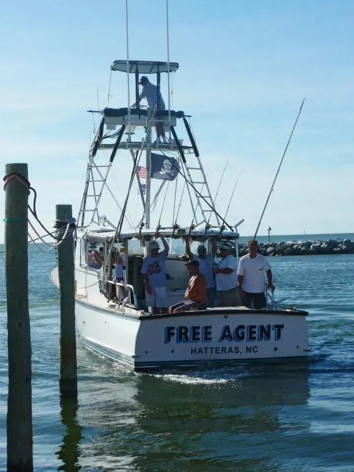 A boat that says free agent on the back of it