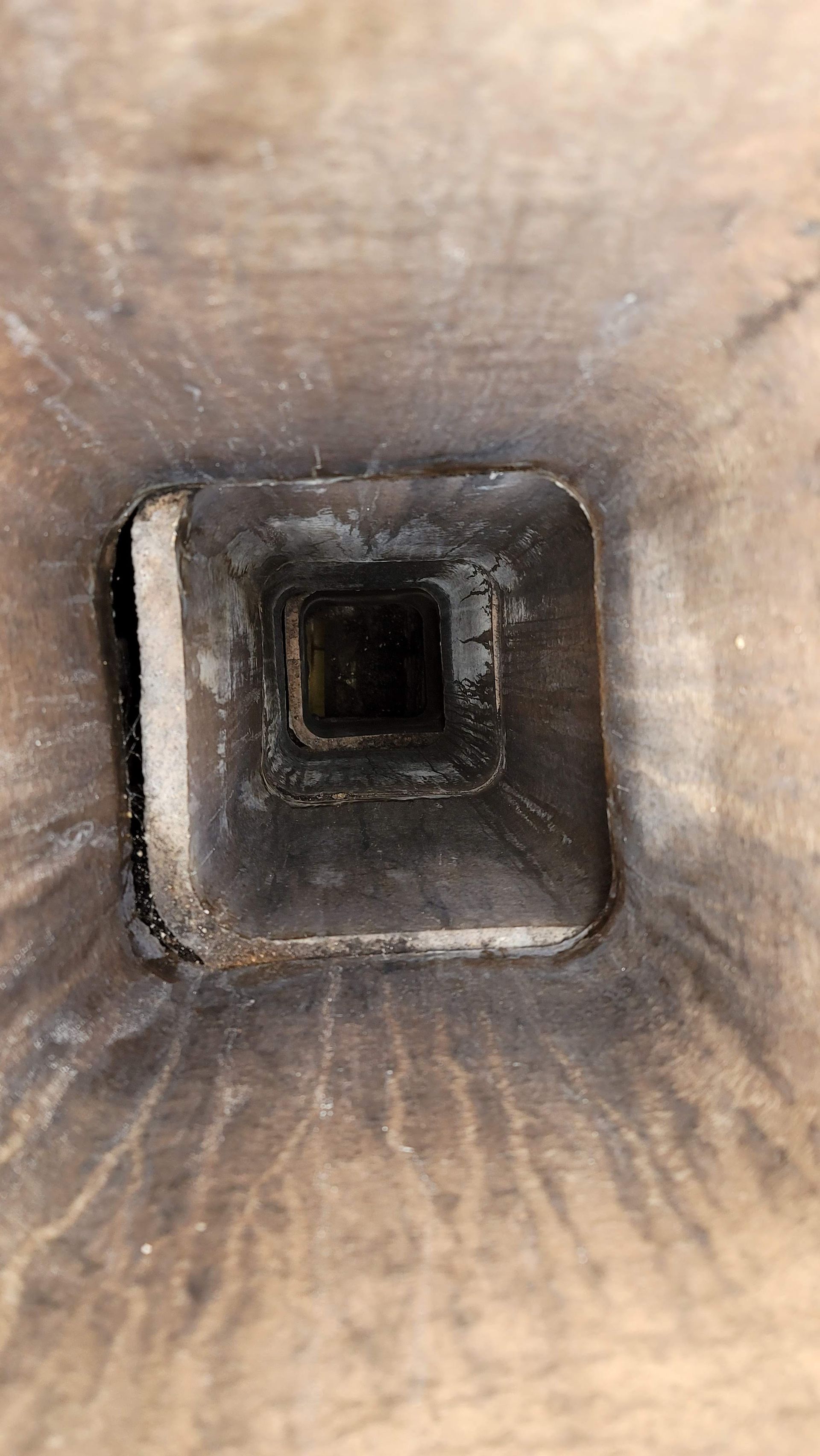 Top Hat Chimney Sweeps a picture of an Offset Flue tile of a chimney