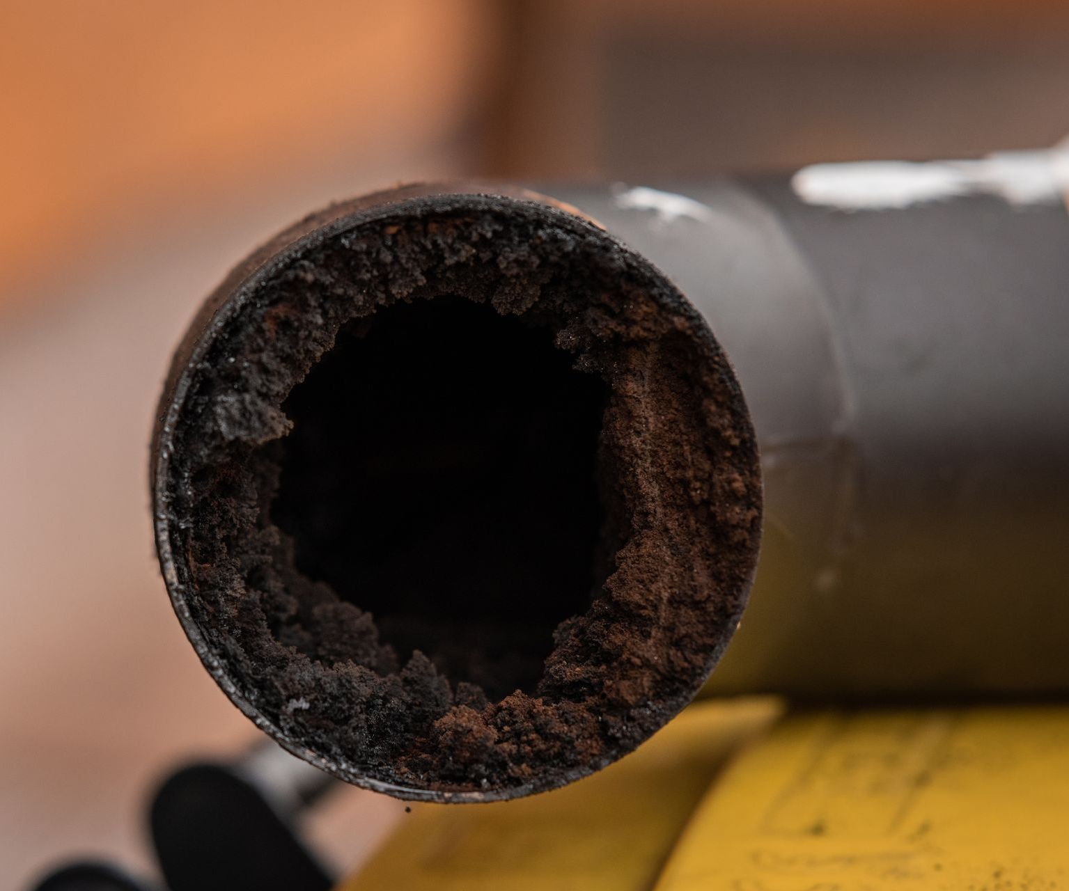 a close up of a rusty pipe on a table .