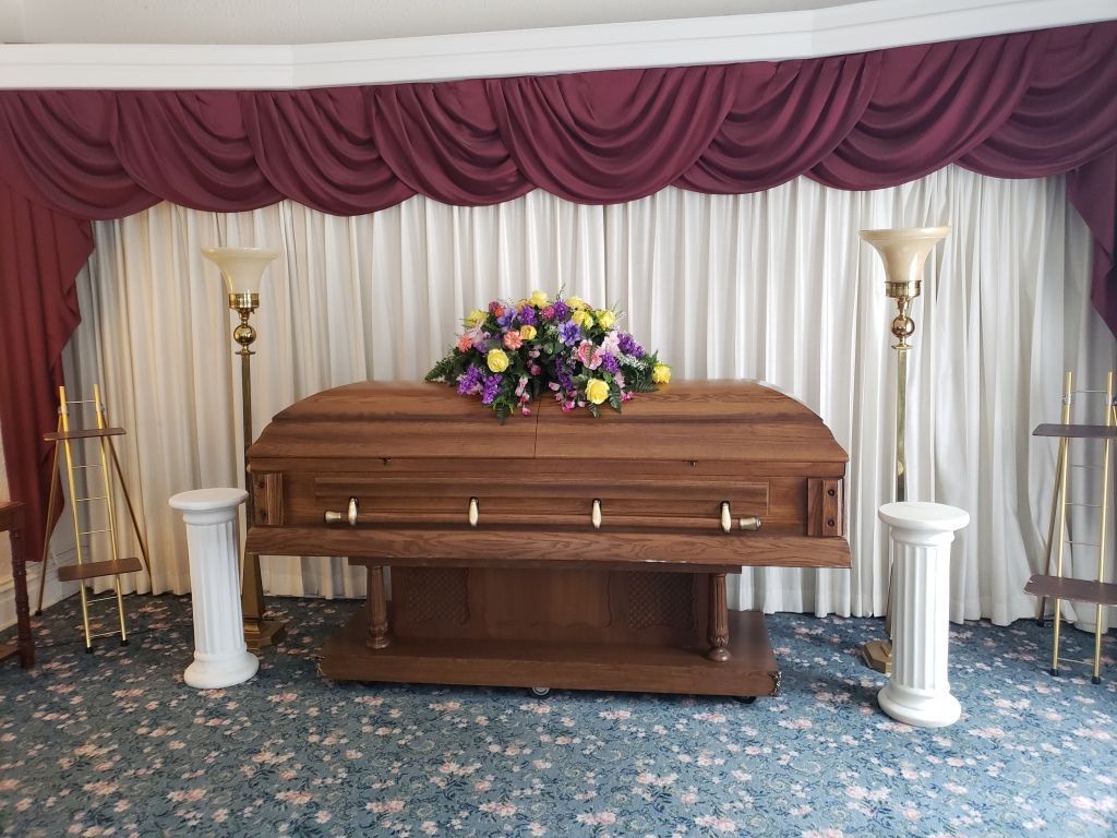 Several photos of interior and exterior view of Brough Funeral Home in Miamisburg, OH