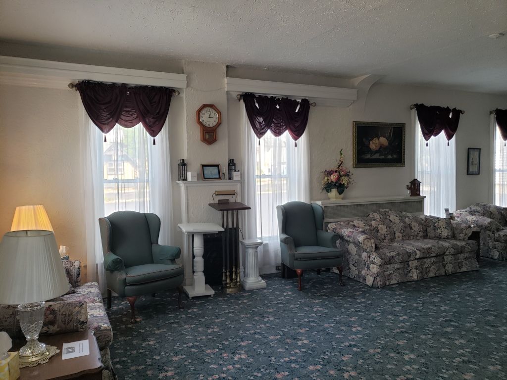 Several photos of interior and exterior view of Brough Funeral Home in Miamisburg, OH