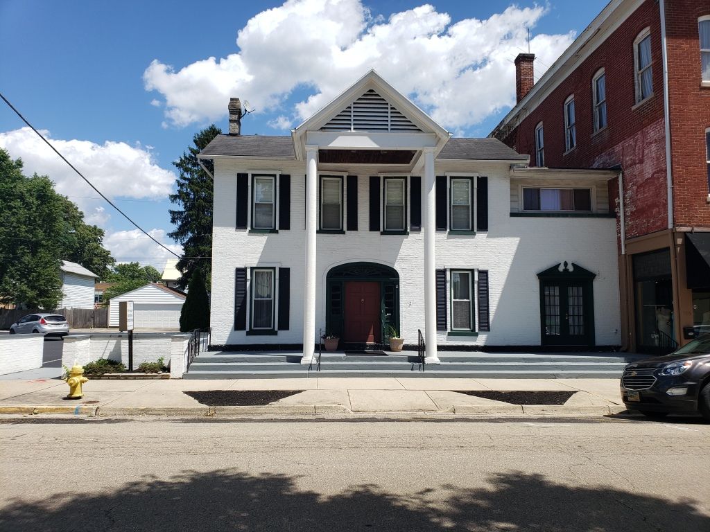 Several photos of interior and exterior view of Brough Funeral Home in Miamisburg, OH