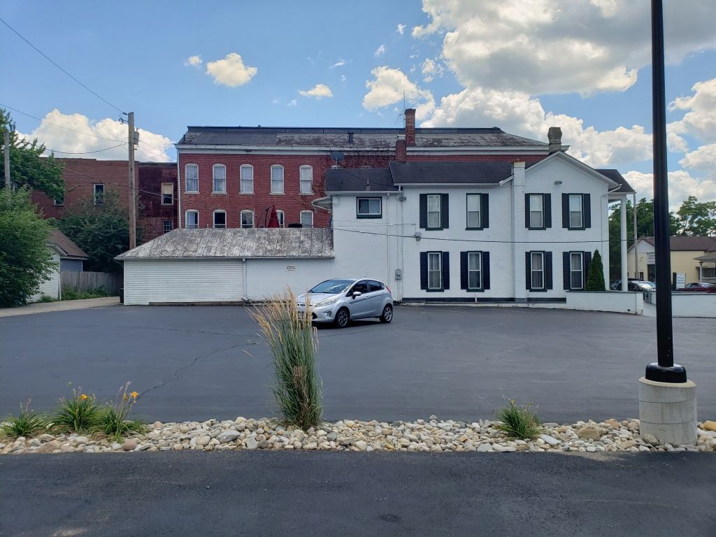 Several photos of interior and exterior view of Brough Funeral Home in Miamisburg, OH