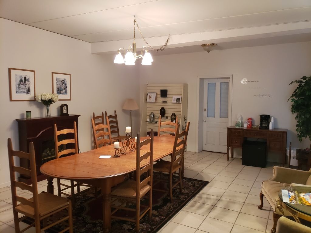 Several photos of interior and exterior view of Brough Funeral Home in Miamisburg, OH