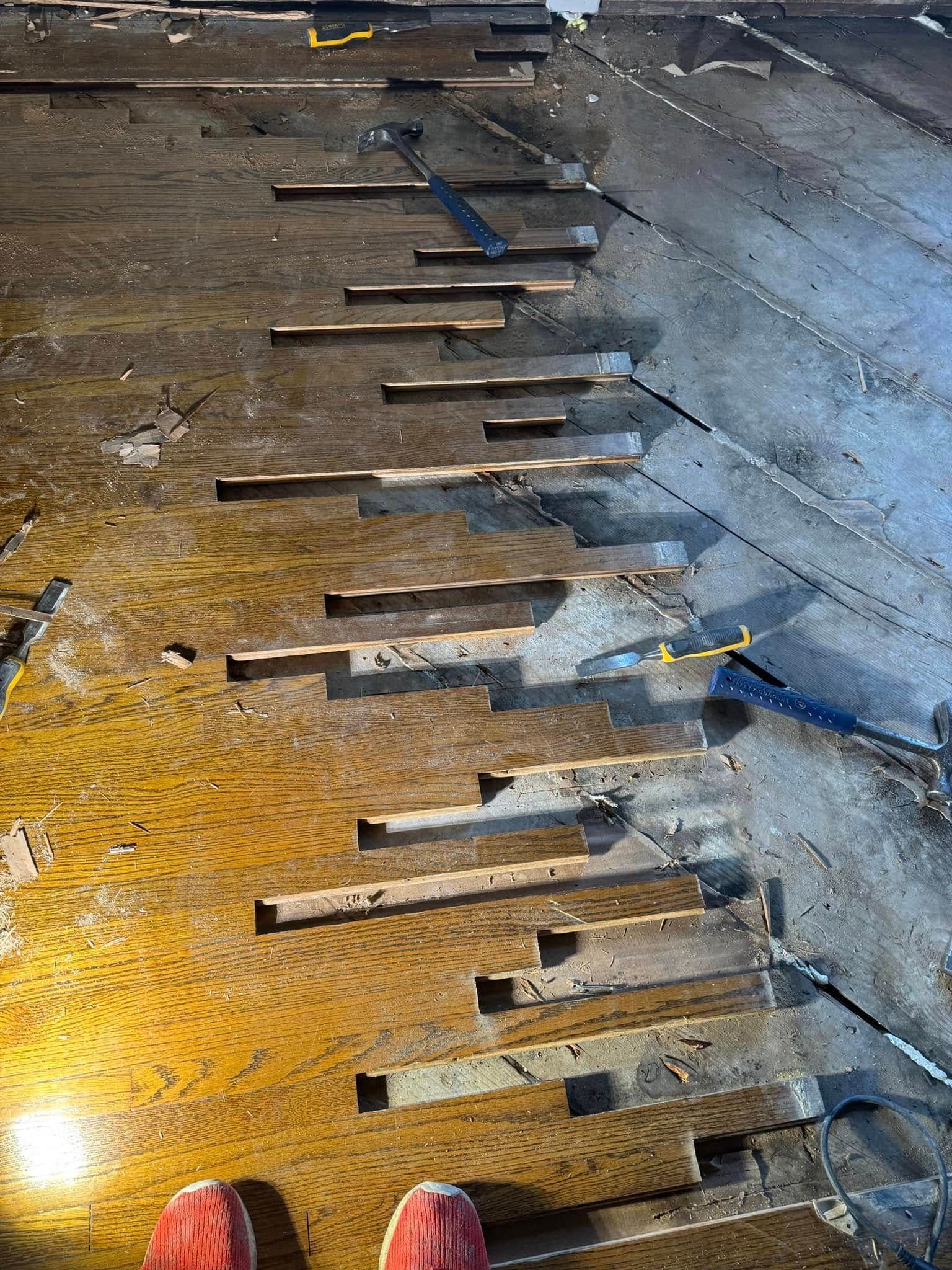 Repairing broken pieces of wooden floor