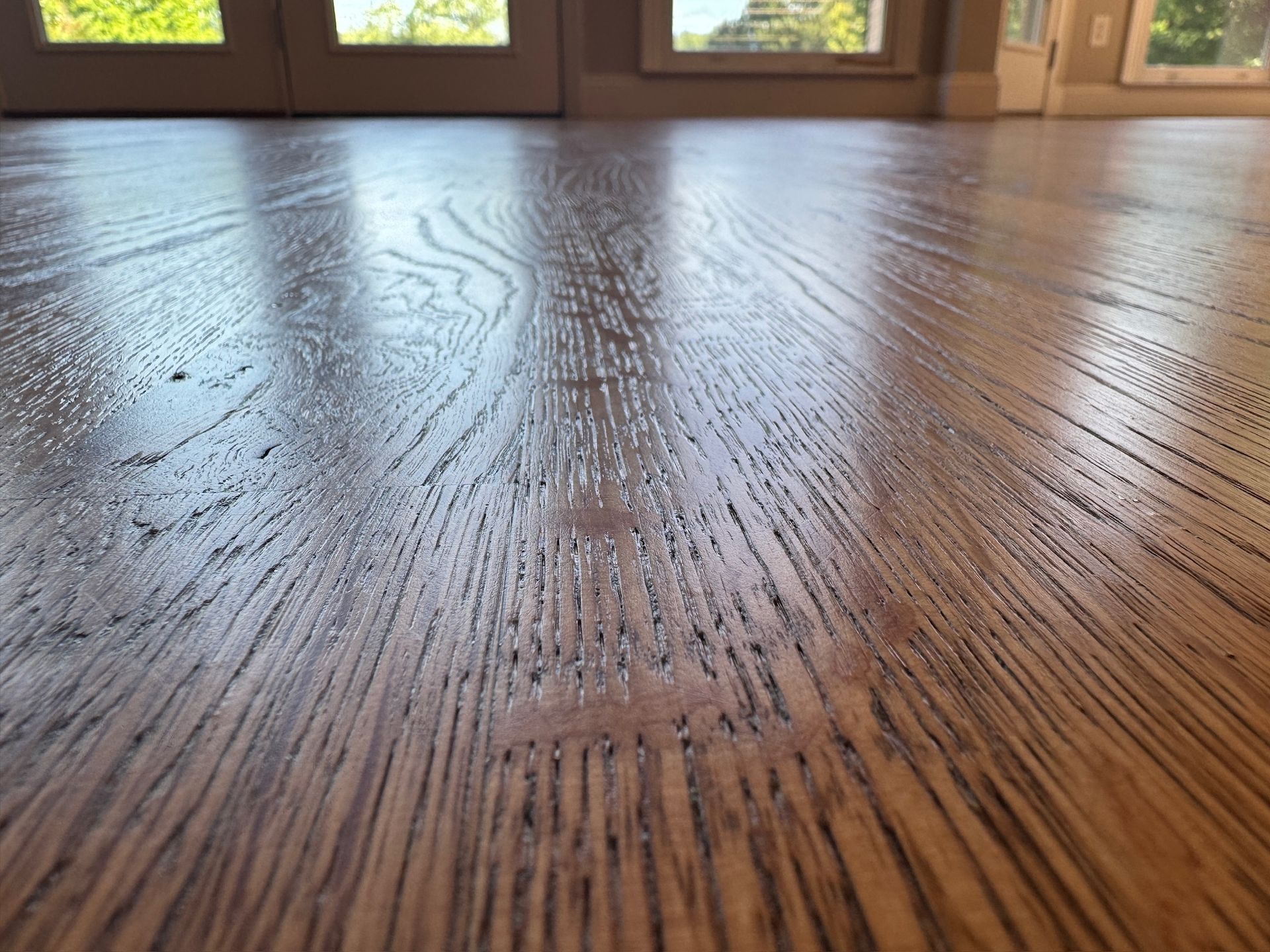 A close up of a wooden floor in a room