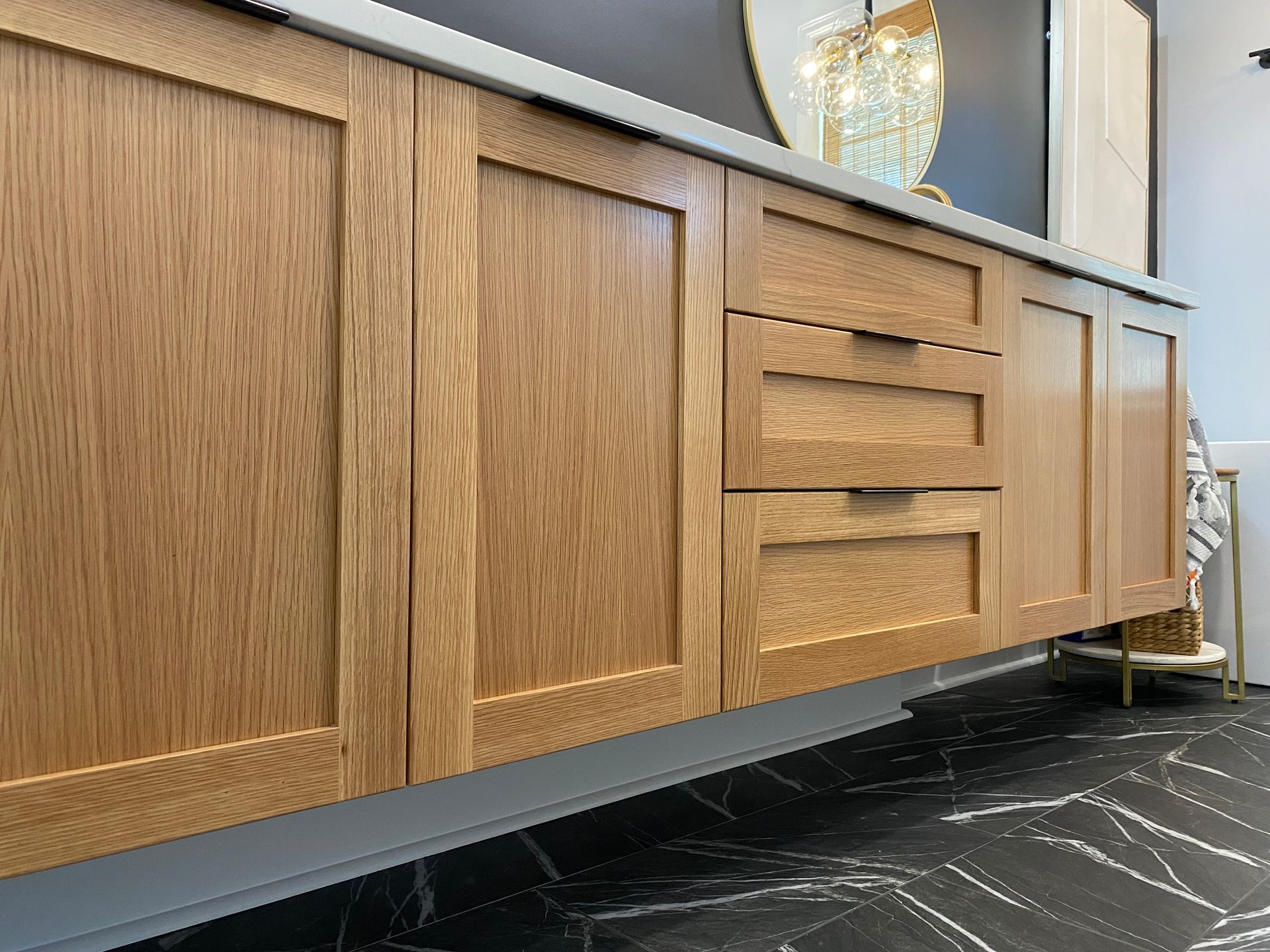 White oak floating European style bathroom vanity.