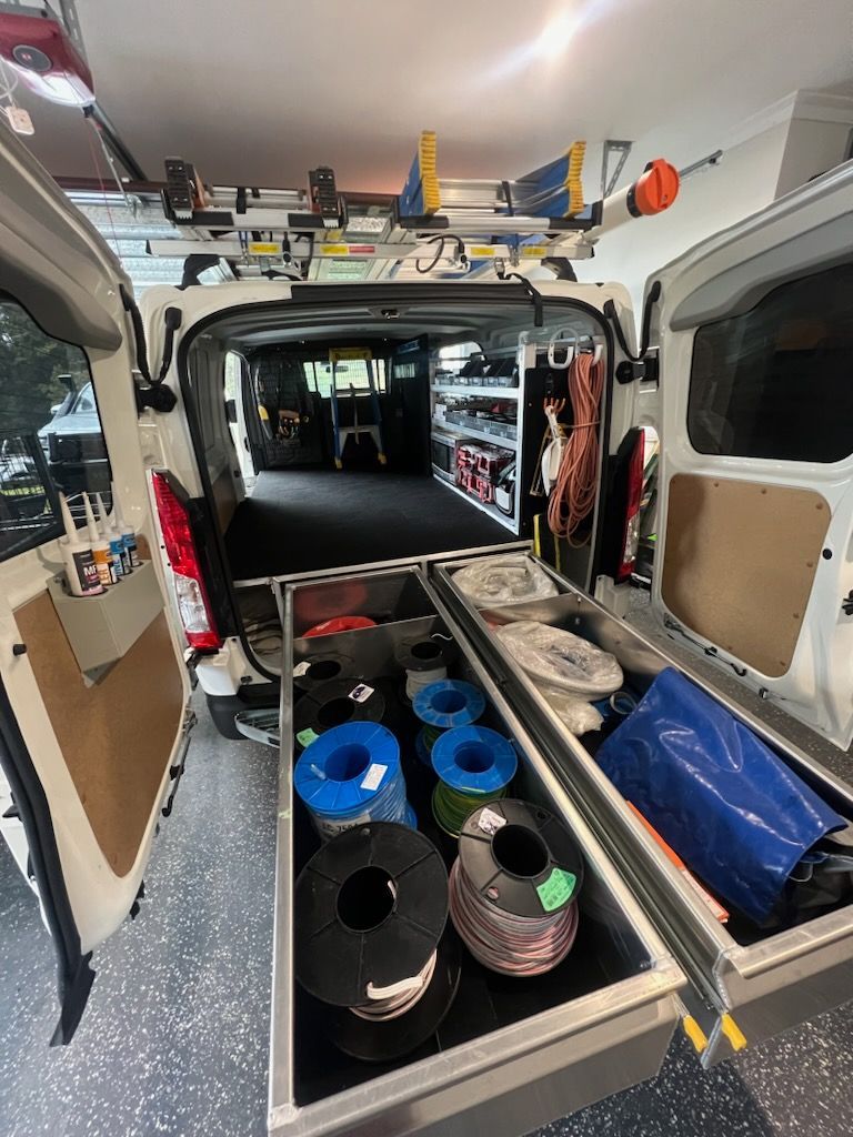 The back of a van with drawers filled with spools of wire — Mingweld Fabrication in Bungalow, QLD