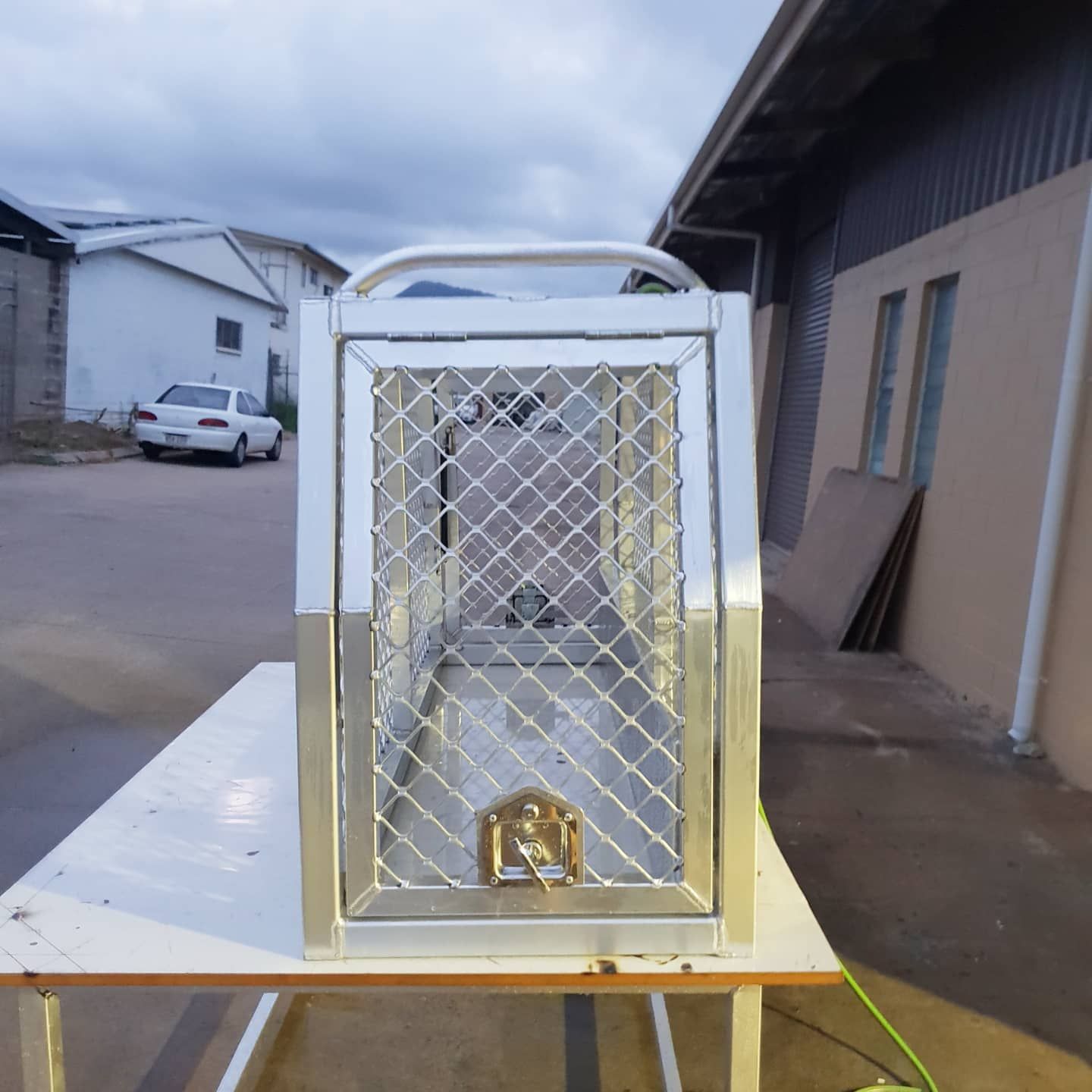 A Cage with The Letter L on It Sits on A Table — Mingweld Fabrication in Bungalow, QLD